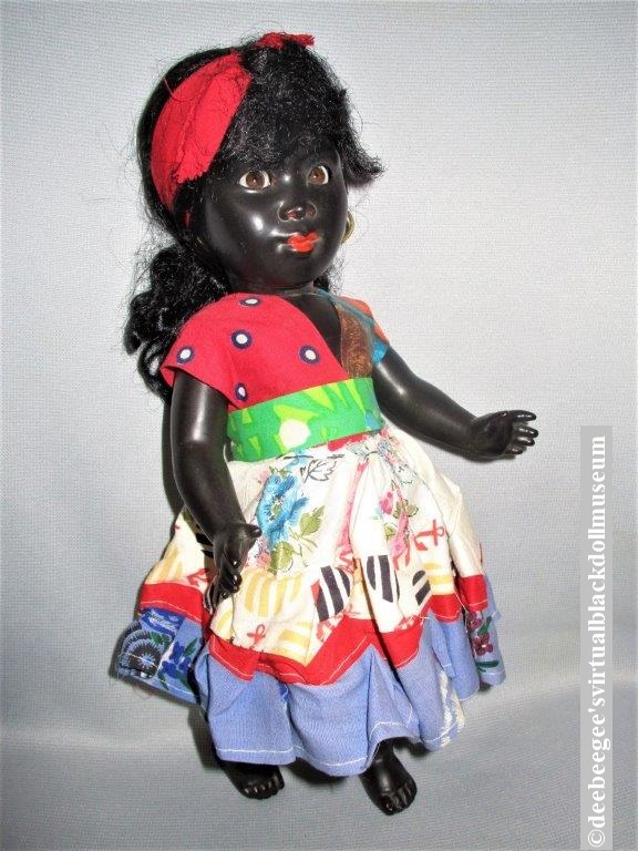 1940s to 1950s hard plastic black doll from Caribbean Island.